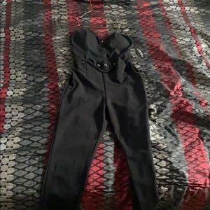 Cute black pantsuit or jumper with buckle